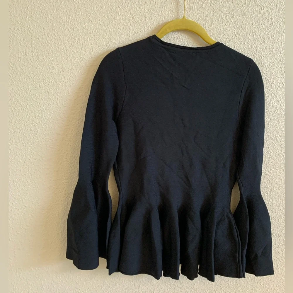 Olivaceous peplum Black Top With Bell Sleeves NWOT🌴